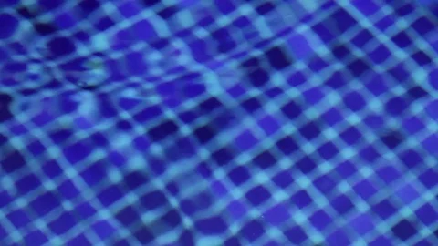 Water drop in a swimming pool Stock Footage 73227434