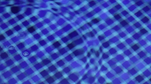 Water drop in a swimming pool 스톡 동영상 73234466