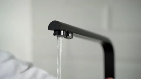 Water drop waste. Kitchen sink Stock Footage 153284293