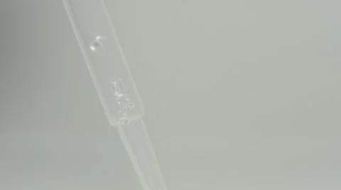 Water drop [white backdrop] taking water samples Stock Footage 66840801