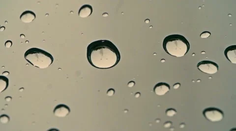 Water droplet glides with reflections on window close up 02 스톡 동영상 49961060