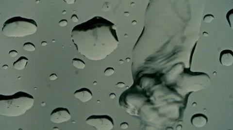 Water droplet glides with reflections on window close up 03 스톡 동영상 49963436