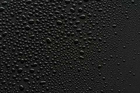 Water droplets on black background. Stock Illustration