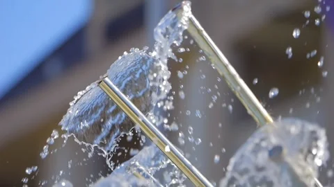 Water droplets in a dynamic display of splashing and mist formation falling.. Stock Footage 283623712