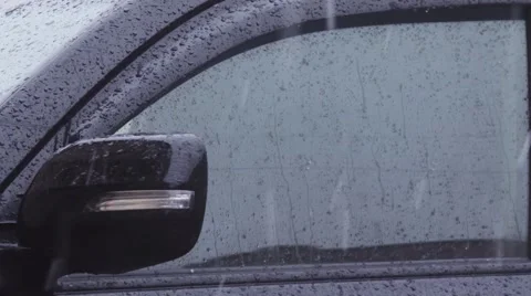 Water droplets form on automobile windshield. Stock Footage 63113104