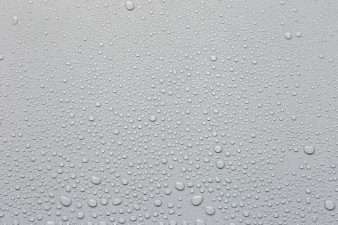 Water droplets on a gray background Stock Photos