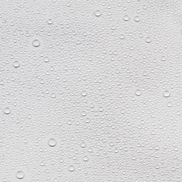 Water droplets on a gray background. Stock Photos