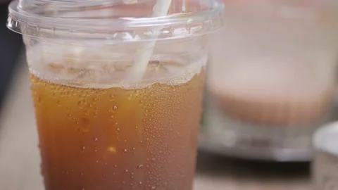 Water droplets on plastic cup surface. Stock Footage 164524598