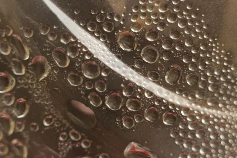 Water droplets on reflective surface Stock Photos