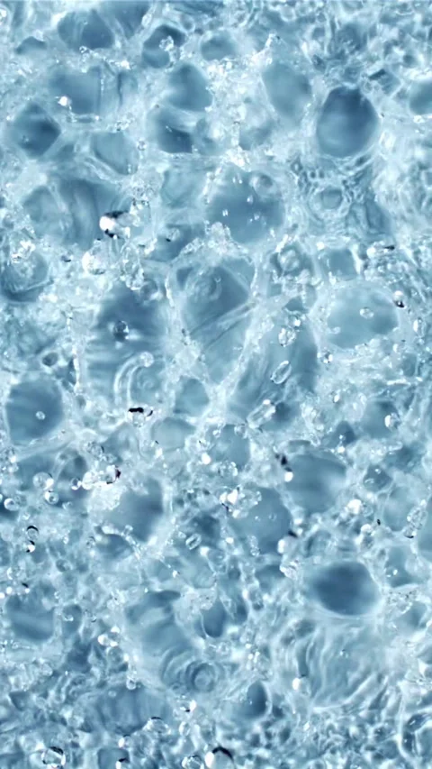 Water droplets rise up and fall. Top view. Filmed on a high-speed camera at 1000 Stock Footage 335291629