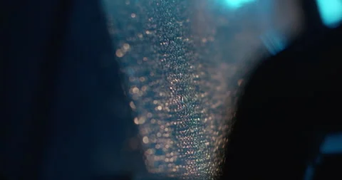 Water droplets sliding down window at night. Stock Footage 271210629