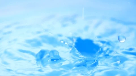 Water droplets (slow motion) Stockbeeldmateriaal 101360970