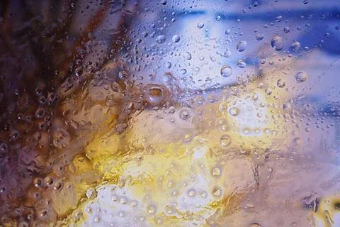 Water droplets on the surface create an abstract texture effect with blurre.. 写真素材