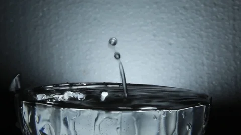 Water Dropping in BowI FULL HD Stock Footage 104657135