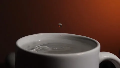 Water Dropping in a Cup Stock Footage 239015994