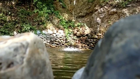 Water dropping in nature Stock Footage 78709823