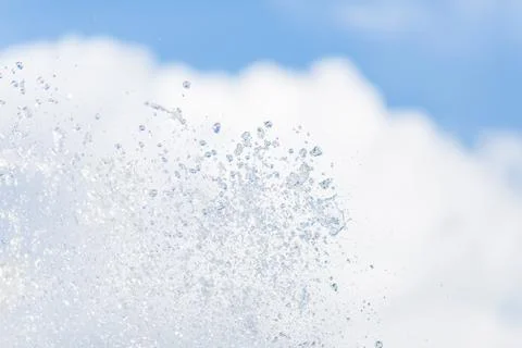 Water drops in the air on the sky. Stock Photos