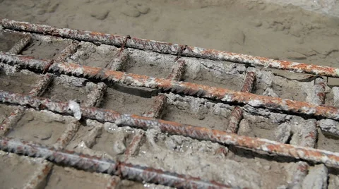 Water drops on armed concrete rusty metal SloMo Stock Footage 56285557