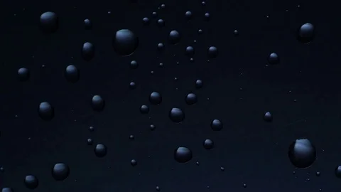 Water drops background. Drops flow down the glass Video stock 75943998