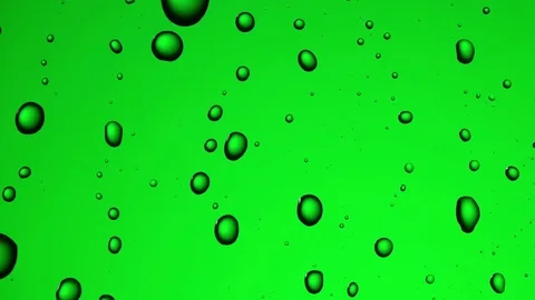 Water drops background. Drops flow down the glass Stock Footage 75944210
