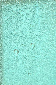 Water drops background. Selective focus. Stock Photos