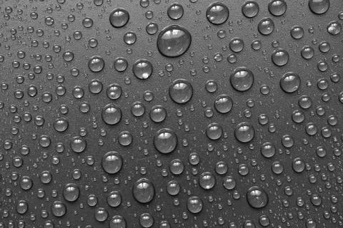 Water drops on black background. Macro. Stock Photos