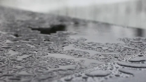 Water drops black marble surface rain background Video stock 111764082
