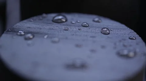 Water Drops on Black Rubber Surface Stock Footage 58754259