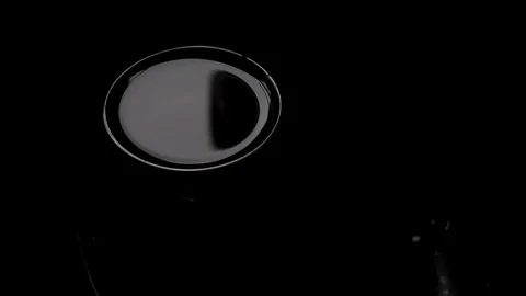 Water drops into black, slow motion, 60 fps Stock Footage 129635816
