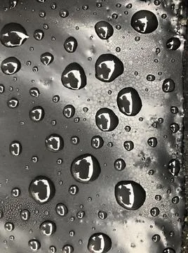 Water drops on black surface. Macro water drops. Stock Illustration