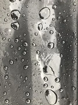 Water drops on black surface. Macro water drops. Stock Illustration
