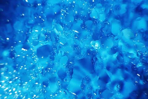 Water drops on a blue background. Abstract blue background. Water drops on .. Foto stock