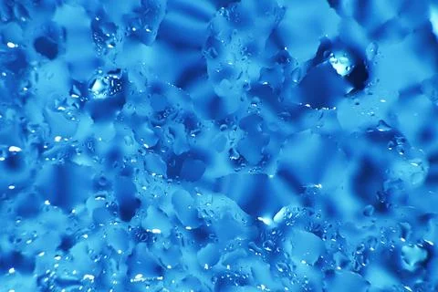 Water drops on a blue background. Abstract blue background. Water drops on .. Foto stock