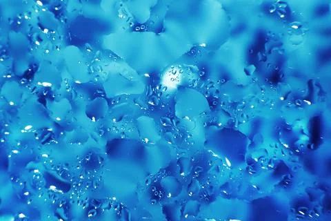 Water drops on a blue background. Abstract blue background. Water drops on .. Foto stock