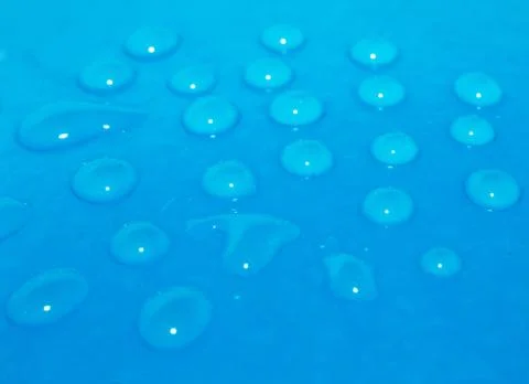 Water drops on a blue background. macro Foto stock