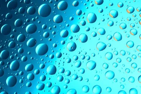 Water drops on blue background Stock Photos