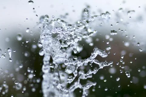Water drops in a blurred background Stock Photos