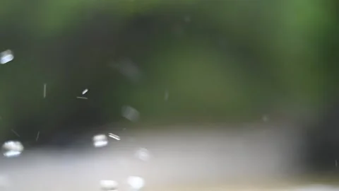 Water drops bounce from a mountain river (slow motion) 스톡 동영상 212753112