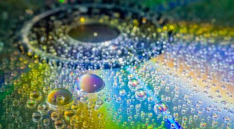 Water drops on a cd Stock Photos