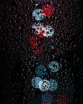 Water drops close up and background lights with bokeh effect Foto stock