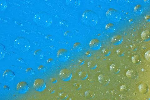 Water drops on colored background Stock Photos