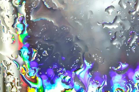 Water drops on colored background Stock Photos