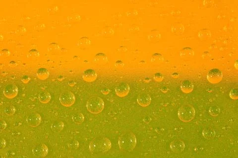 Water drops on colored background. Selective focus. Stock Photos