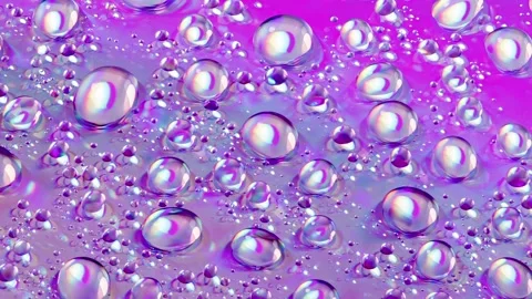 Water drops of different sizes on purple Stock-Footage 229702976