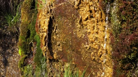 Water drops down rock formation Stock Footage 155086614