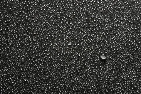 Water drops on the fabric substrate macro Stock Photos