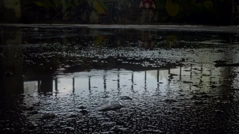 Water drops fall on the floor of an abandoned building. Slow motion 4K Stock Footage 289074930
