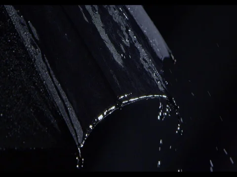 Water drops falling on a black umbrella, slow motion Stock Footage 74222523