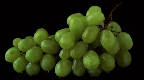 Water Drops Falling On Closeup Bunch Of Green Grapes Isolated On A Black Stock Footage 53002342