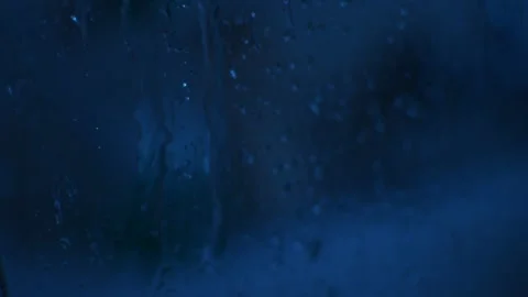 water drops falling on a glass window. w... | Stock Video | Pond5